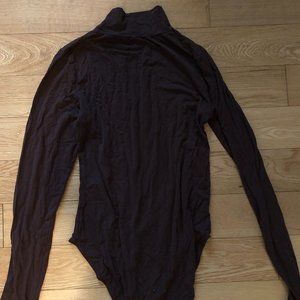 Brown long sleeved turtle neck bodysuit